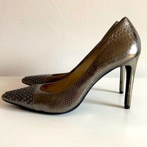 Women’s silver studded toe heels. Size 11.
